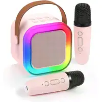 Mini Máquina de Karaoke Portátil con 2 Micrófonos Inalámbricos (Rosa Pastel). Mini Máquina de Karaoke Portátil con 2 Micrófonos Inalámbricos (Rosa Pastel).