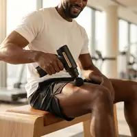 Pistola de masaje BODYLIFE con 4 cabezales para aliviar tensiones musculares.
