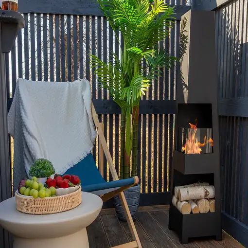 Chimenea bioetanol pyramid garden negra con cristal