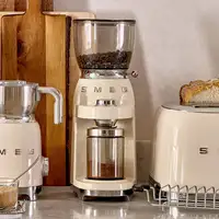 Smeg CGF11CREU molinillo de café 150 W Crema de color, Transparente