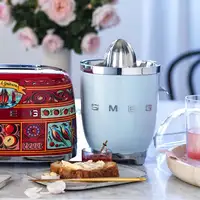 Smeg CJF11PBEU prensa de cítricos eléctricos 70 W Azul