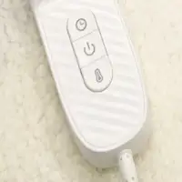 Manta eléctrica color verde y beige 130 x 180 cm