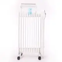 Radiador de aceite blanco de bajo consumo con recipiente para humidificación Radiador de aceite blanco de bajo consumo con recipiente para humidificación