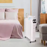 Radiador de aceite blanco de bajo consumo con recipiente para humidificación Radiador de aceite blanco de bajo consumo con recipiente para humidificación